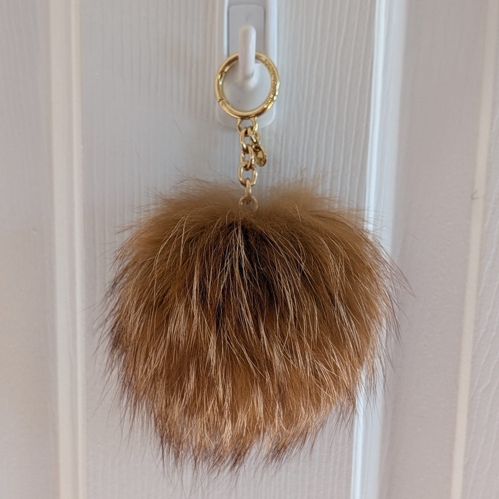 Michael Kors tan fur pom